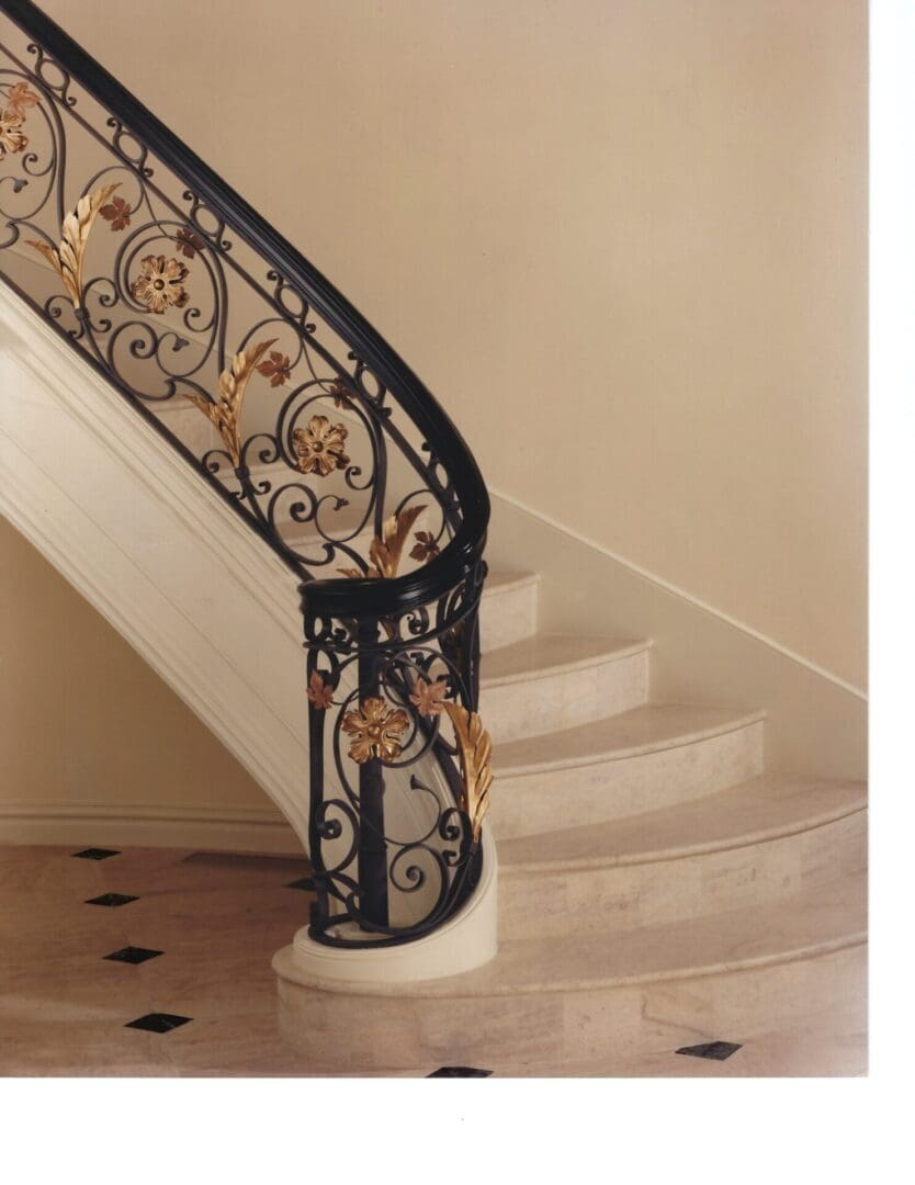 Elegant spiral staircase with ornate railing.