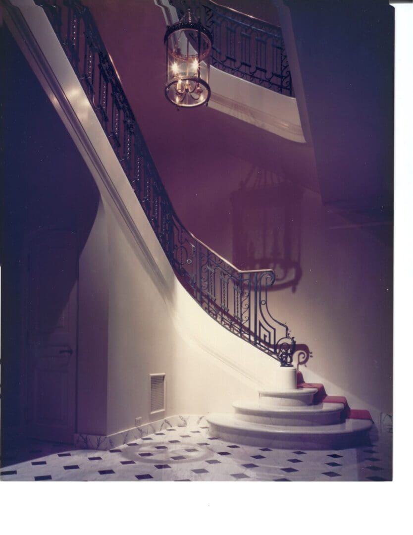 Elegant spiral staircase with ornate railing.