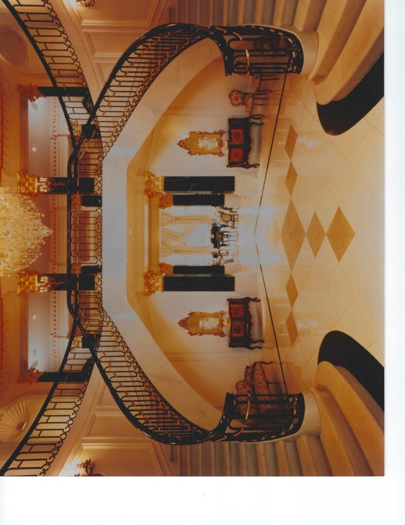 Elegant grand staircase in luxurious interior.